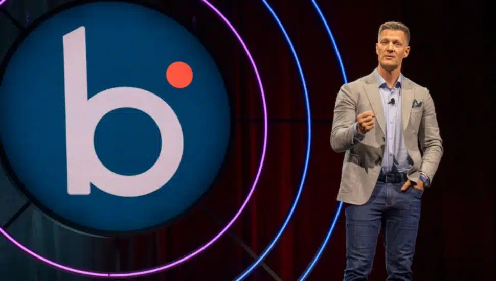 Boomi CEO Steve Lucas stands on stage.
