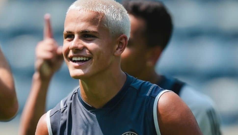 Cavan Sullivan smiles on the pitch.