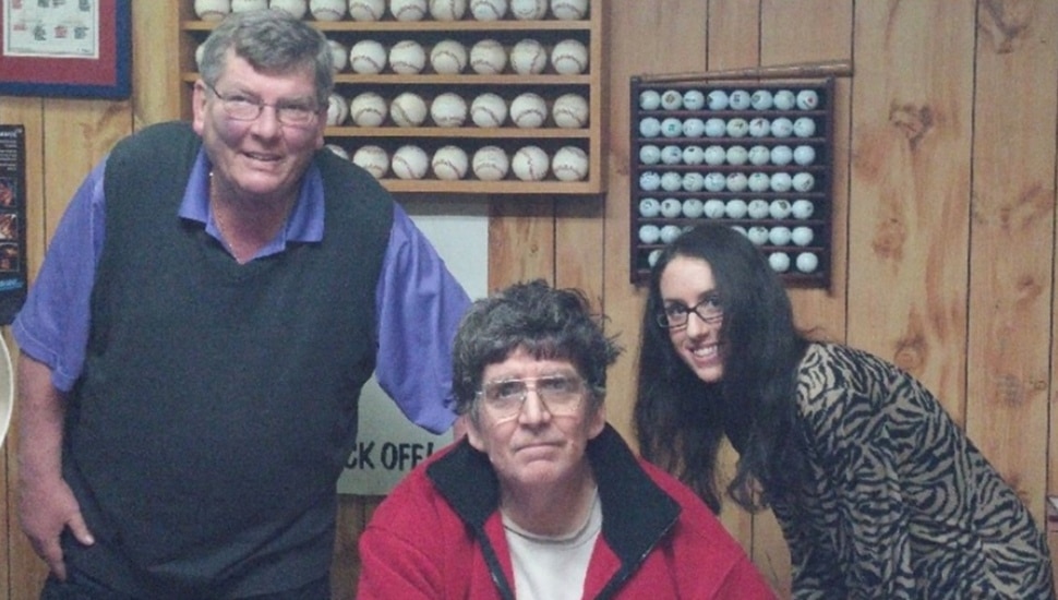 Owners of family-owned business pose for picture.