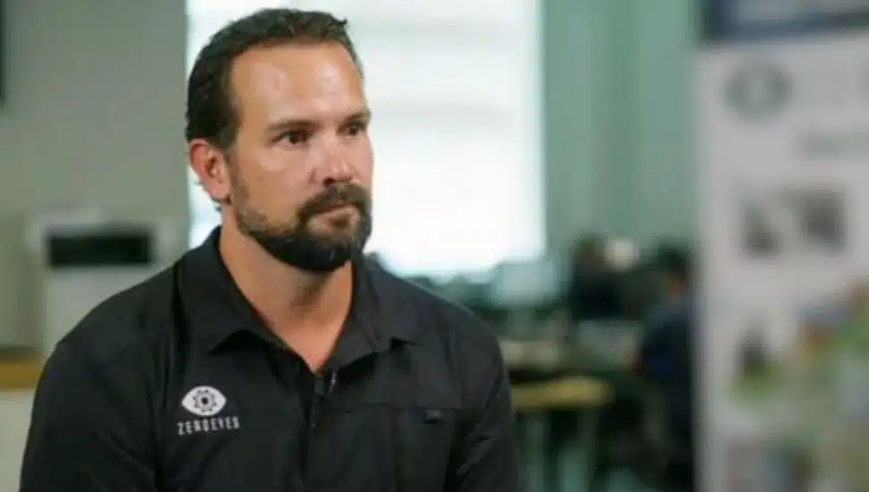 Mike Lahiff wears a black ZeroEyes polo.