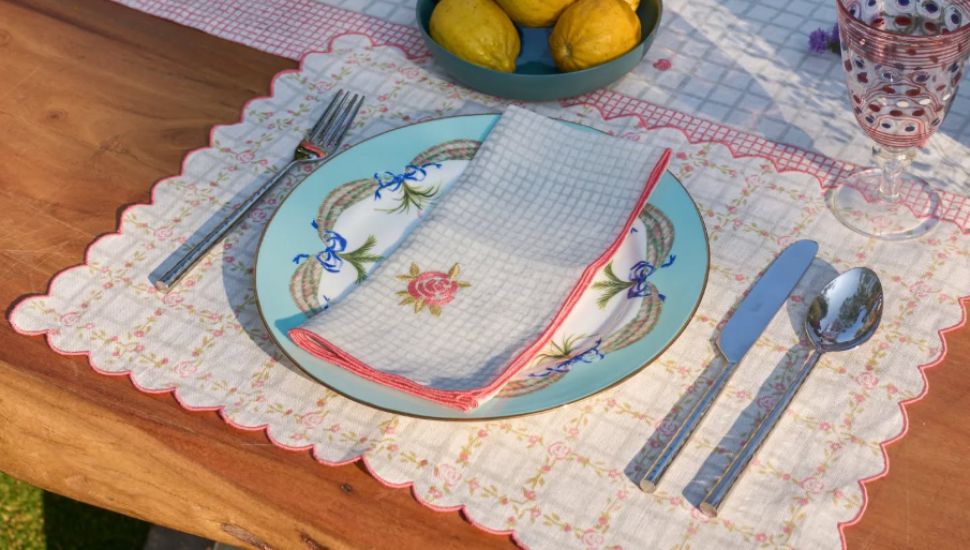 A dinner place setting from Neem Crafts.