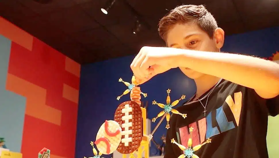 Nicky Papa assembles Lego at the LEGOLAND Discovery Center Philadelphia.