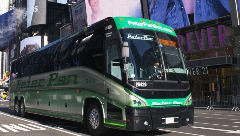 A Peter Pan bus on the road.