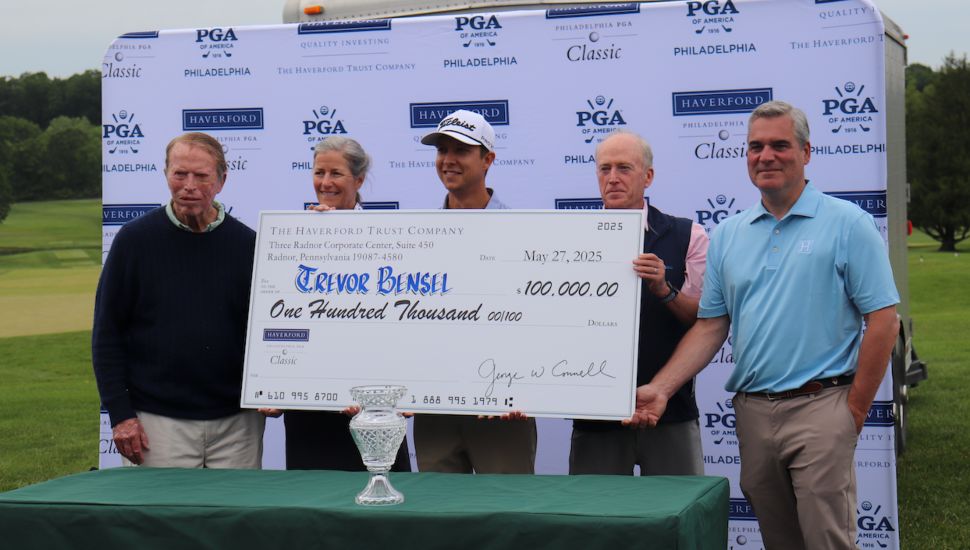 Trevor Bensel accepts a check for winning the Haverford Trust Philadelphia PGA Classic.