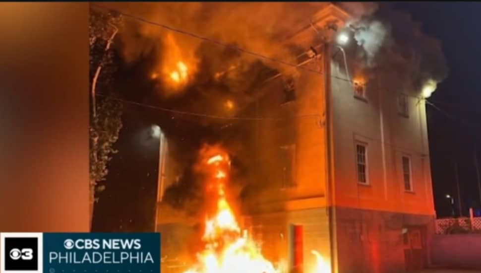 The Fire Chief's Memorial in flames at Elmwood Park in Norristown.