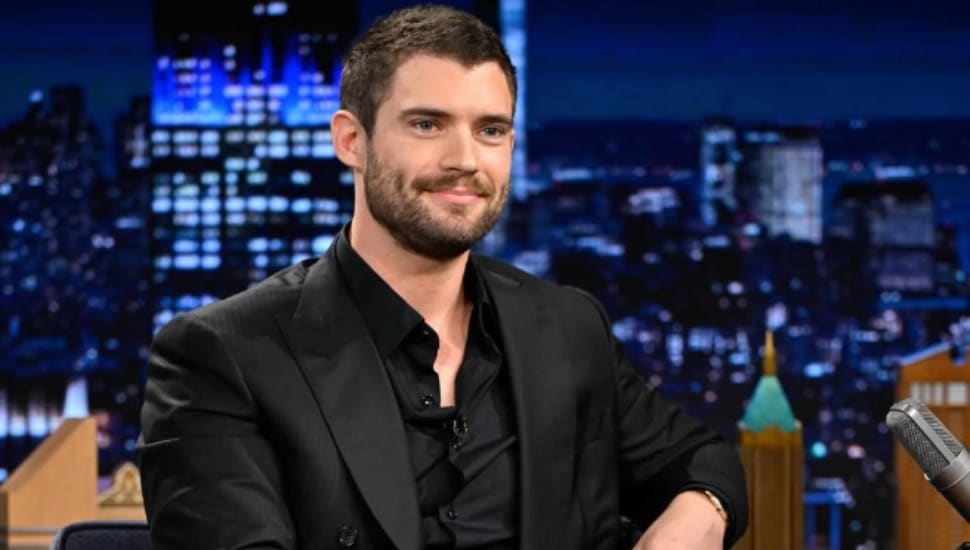 David Corenswet sits on the set of The Tonight Show.