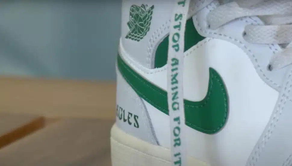 A closeup of the kelly green-custom Air Jordans for Saquon Barkley.