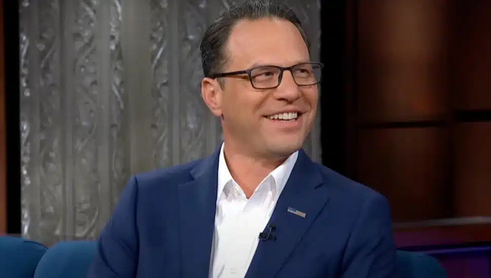 Governor Josh Shapiro smiles at Stephen Colbert on The Late Show.
