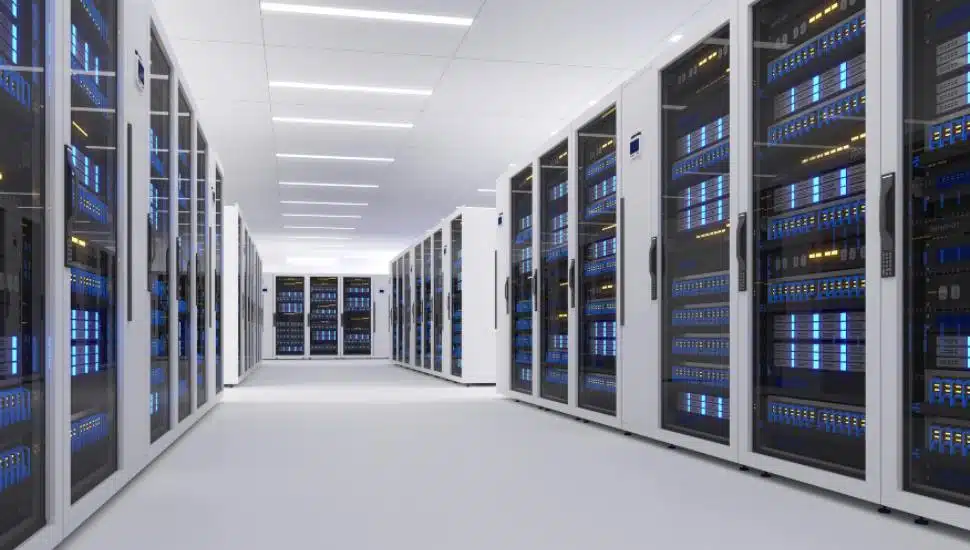 Shot of Data Center With Multiple Rows of Fully Operational Server Racks.