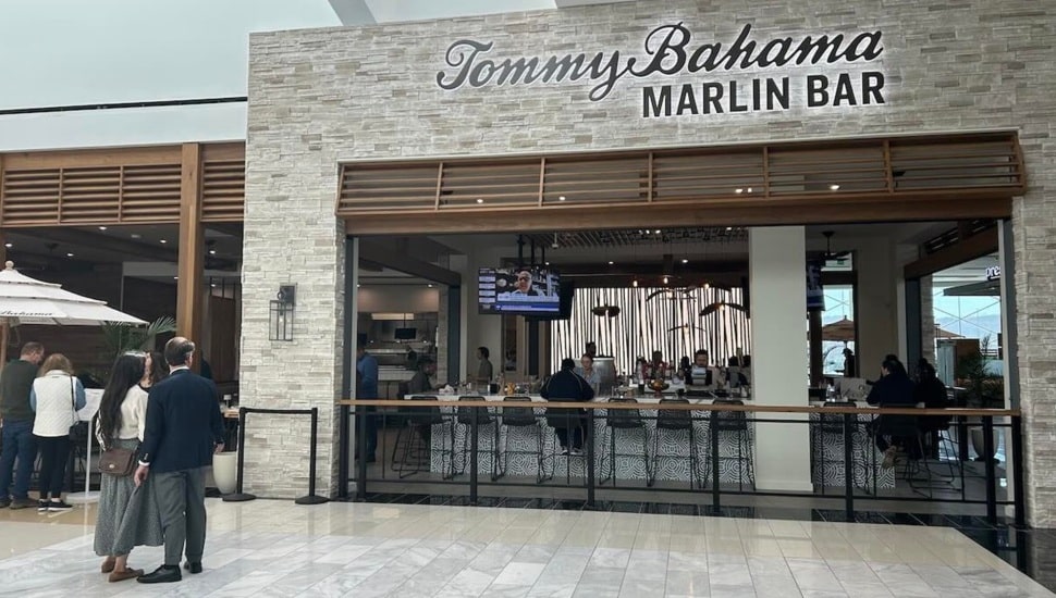 Exterior view of bar and grill inside a mall.