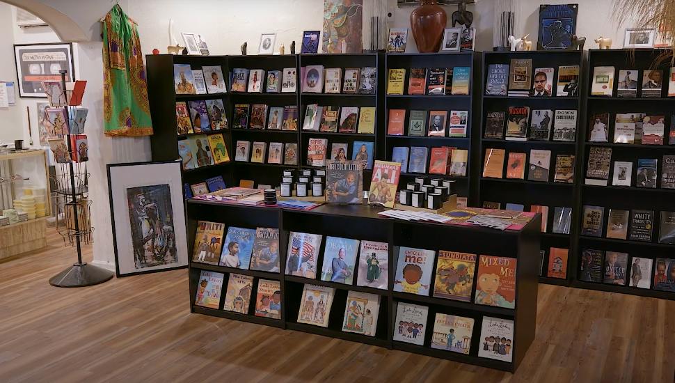 Shelves covered in books about black culture and community in the Black Reserve Bookstore.