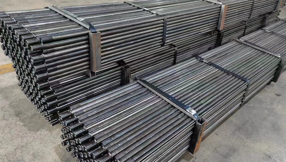 Processed steel bundled on a warehouse floor from DYWIDAG.