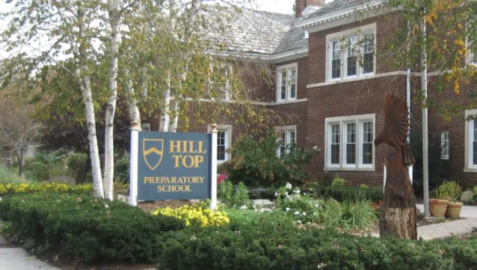Out front of the Hill Top Preparatory School.