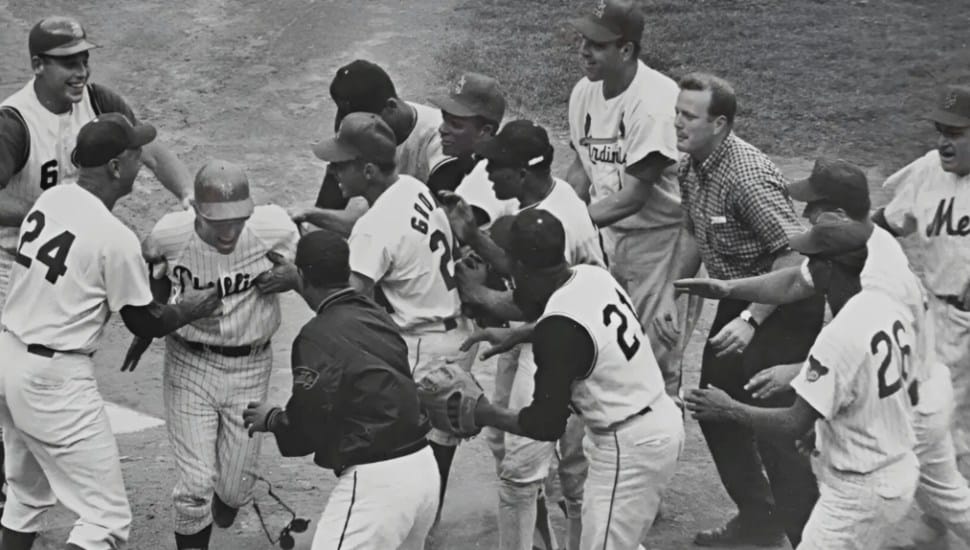 Johnny Callison is met by teammates after a walk-off home run in the 1964 MLB All-Star Game.