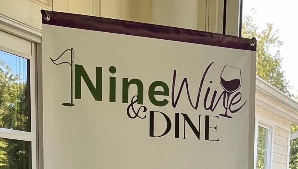 Banner that reads Nine Wine & Dine.