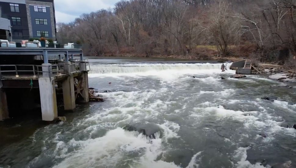 Buildings and a dam along the Brandywine River.