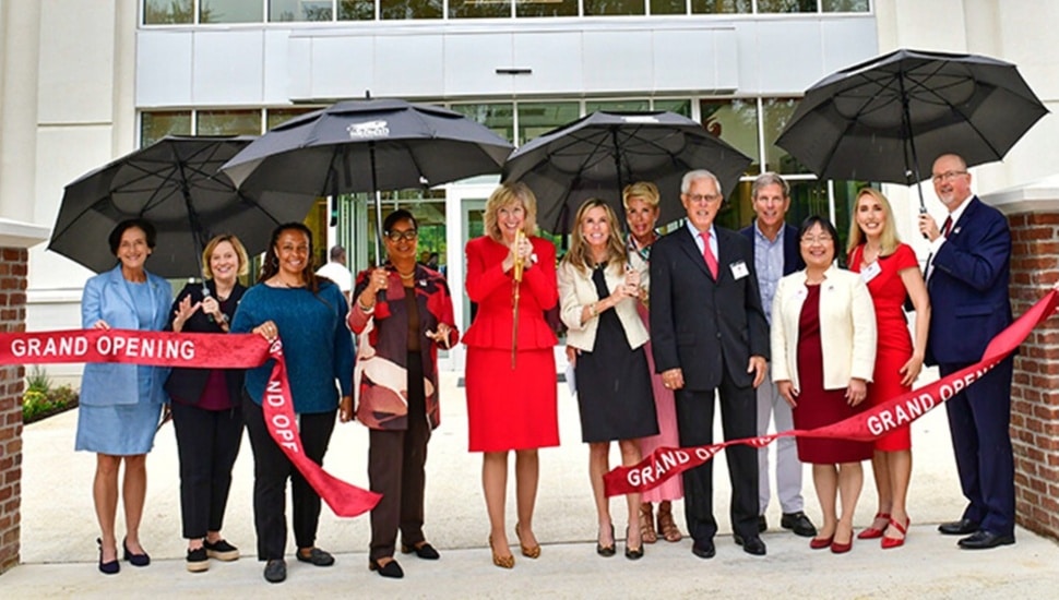 College administrators cut ribbon on new healthcare facility.