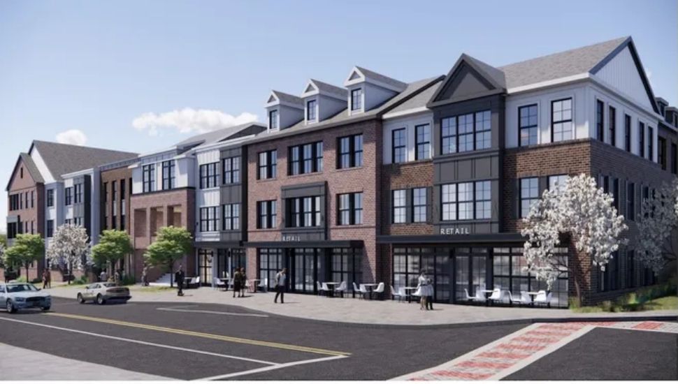 Rendering of Goodnoe Family Homestead redevelopment, featuring retail store fronts with apartments on the upper floors.