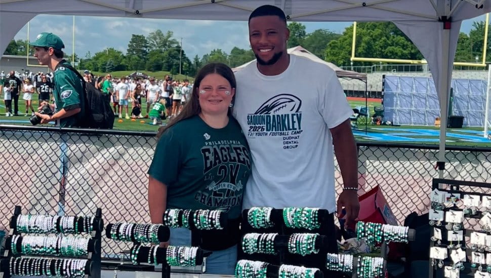 Samantha's Beads founder Samantha Martin with Philadelphia Eagles running back Saquon Barkley.