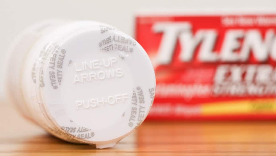 A Tylenol pill bottle and box.