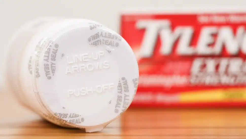A Tylenol pill bottle and box.