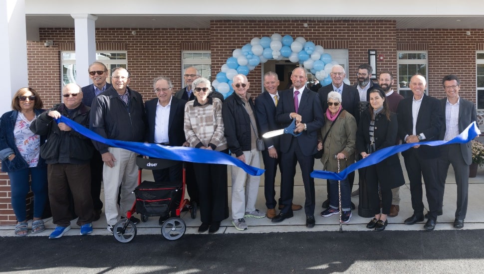 Ribbon cutting for new senior living community.