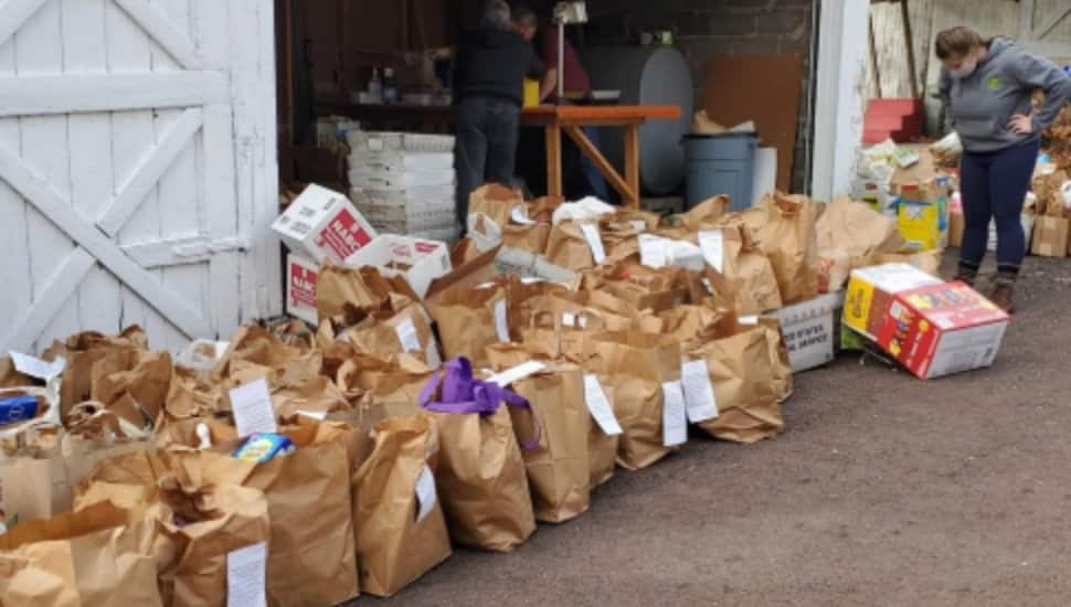 Volunteers prep for a food drive.