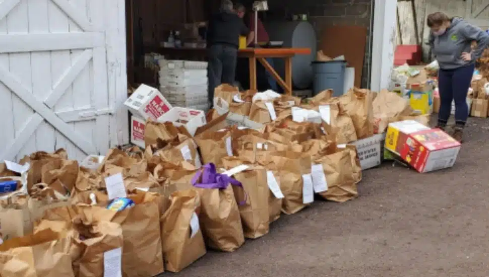 Volunteers prep for a food drive.