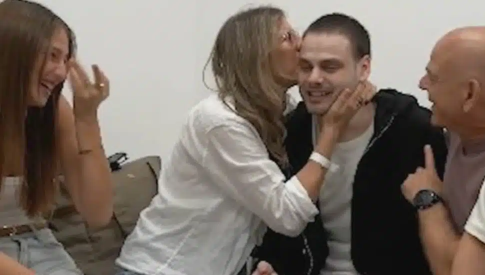 Alon Ohel reunites with family.