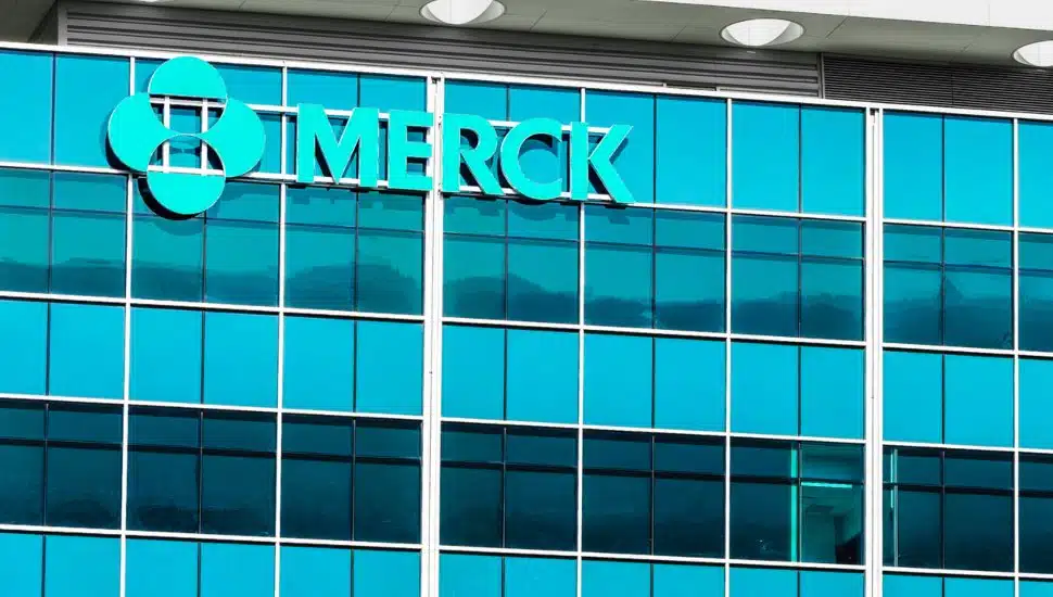 Merck sign adorned the top of a building.