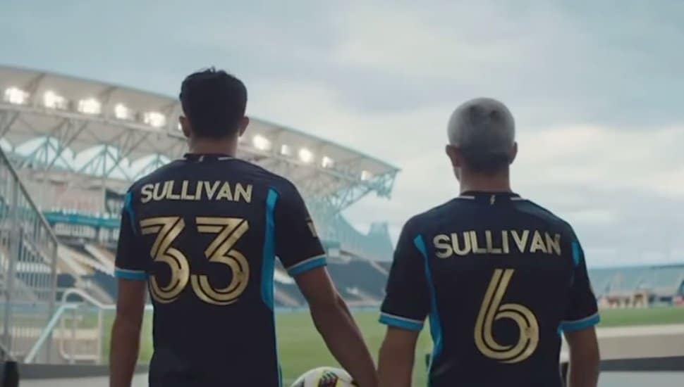 Quinn Sullivan walking onto the pitch with brother, Cavan Sullivan.