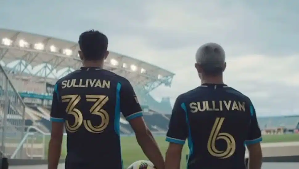 Quinn Sullivan walking onto the pitch with brother, Cavan Sullivan.