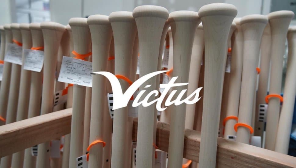 Freshly-made, unpainted baseball bats at the Victus Sports warehouse.
