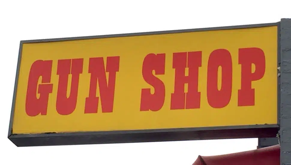 A sign for a gun shop.