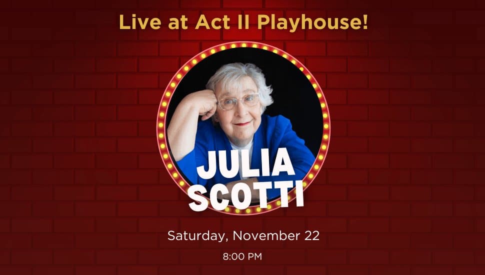 Promotional poster for Julia Scotti live at Act II Playhouse on Saturday, November 22 at 8 PM, featuring a photo of the comedian in a blue jacket.