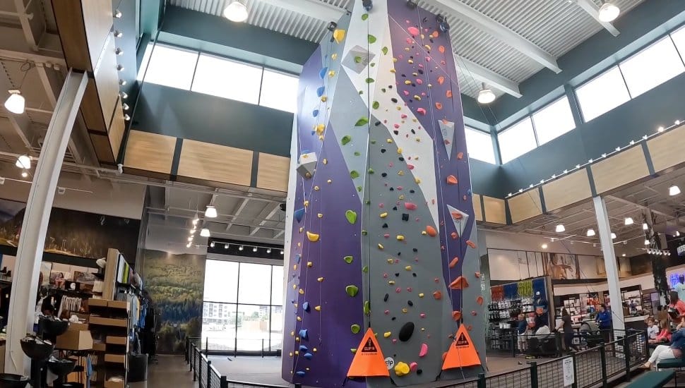 A rock climbing wall in a Dick's House of Sport.