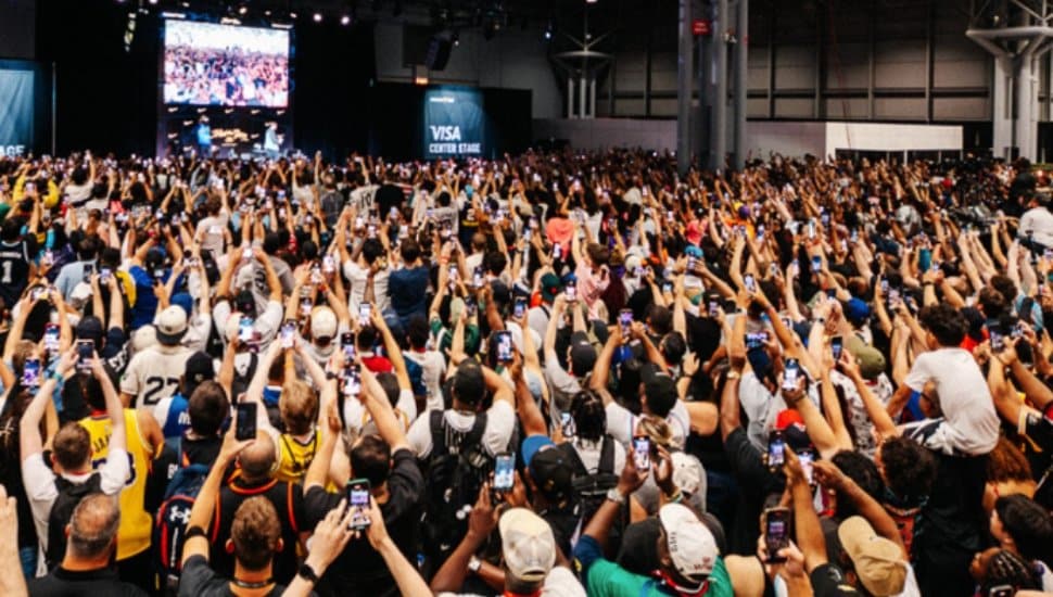 Over view of fans pointing cameras at the stage at Fanatics Fest.