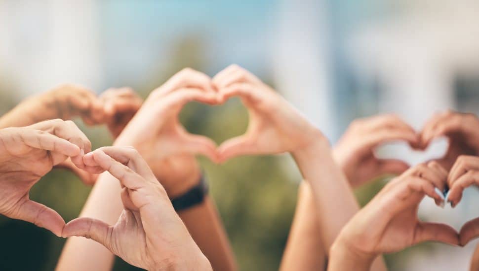 Hands making the heart symbol.