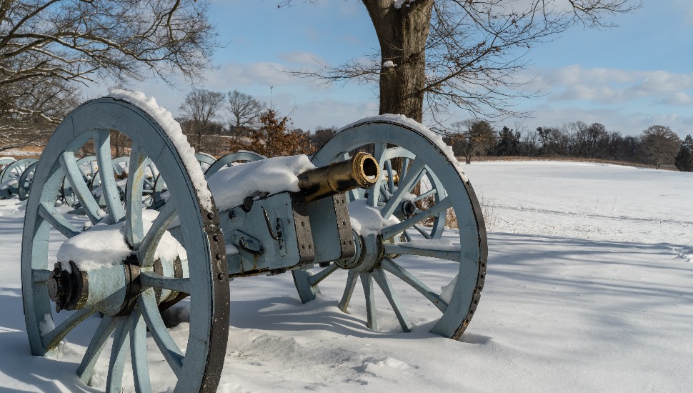 Snow covered Revolutionary War cannons at Valley Forge National Historical Park.