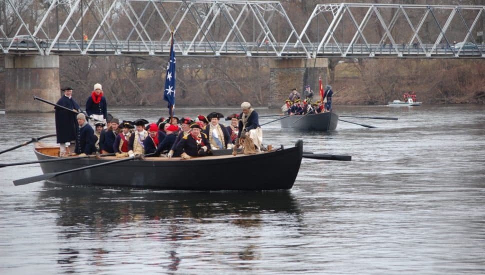 Reenactors crossing the Delaware River.