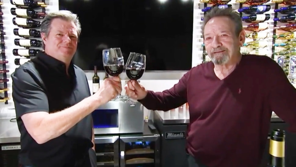 John Irvin and Robert Goodwin toast their new wine tasting room, John Robert Cellars, in Media.