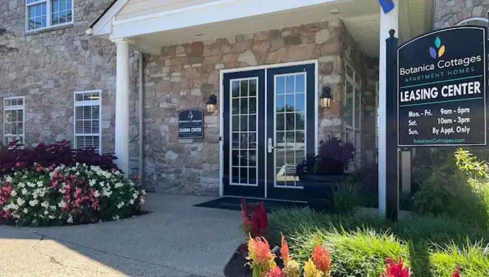 Flowers bloom outside of the Botanica Cottages Leasing Office.