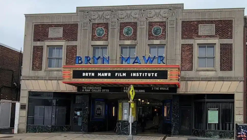 The facade of the Bryn Mawr Film Institute lights up during the day.
