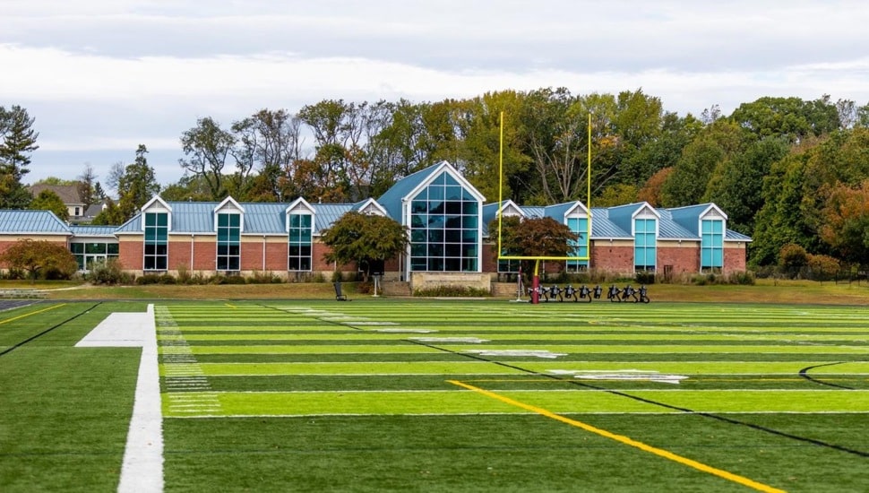 Football field and fieldhouse.