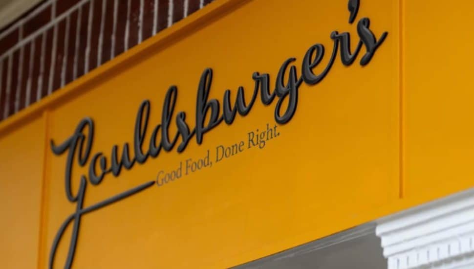 The Gouldsburger's sign hangs over the storefront.