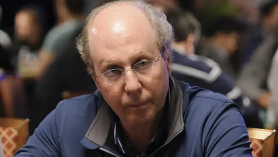 Jeff Yass sits at a poker table.