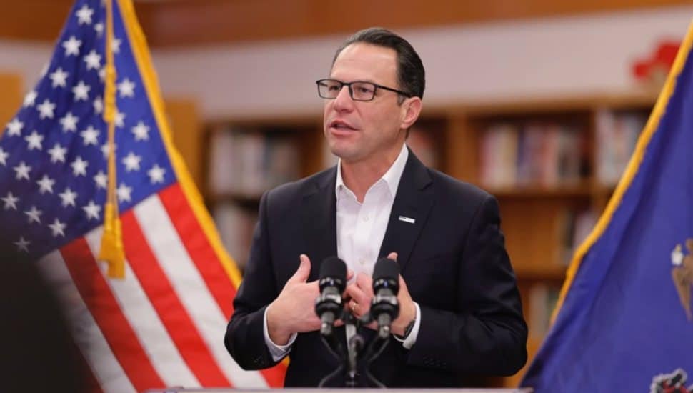 Josh Shapiro speaks from a podium.