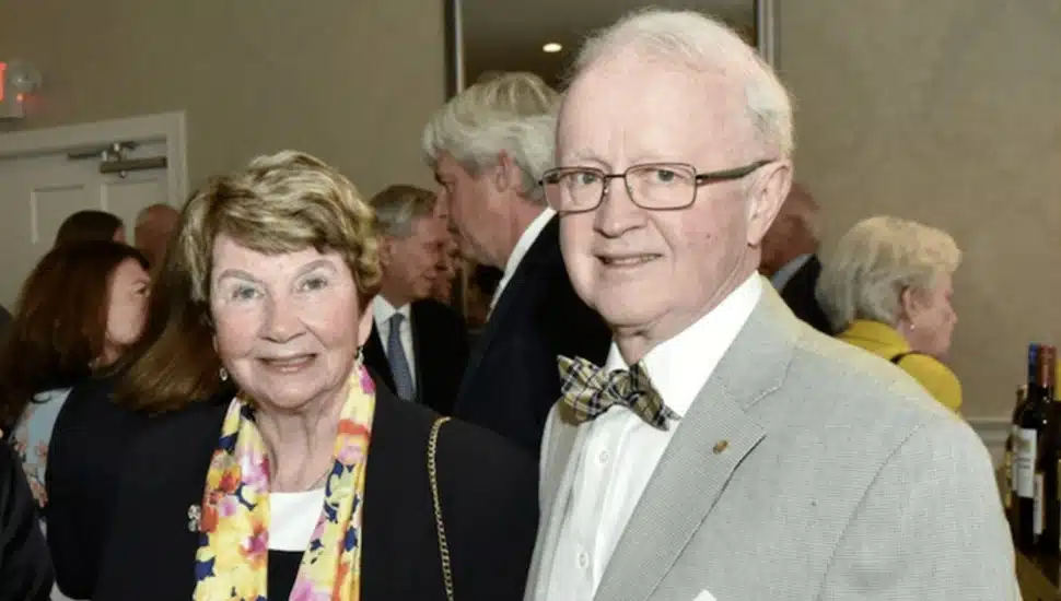 Older couple at awards banquet.