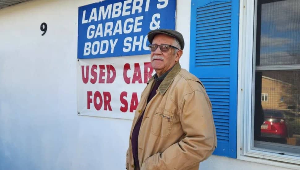 Thomas Lambert at his auto body shop.
