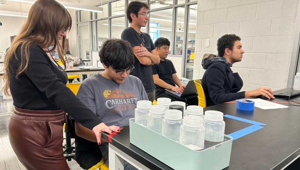 Montgomery County Community College Computer Science majors Joshua Jang and Kyle Alcantara, Mechanical Engineering major Van-Allen Schmidt, Electrical Engineering major Miguel Grimaldos-Garcia and Engineering major Stefania Schianodicola work together on the Merck Automation and Innovation Challenge.